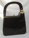 Widegate patent bag with beautifully designed brass detail